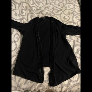 Short sleeve Black sweater lined in sequence Size large